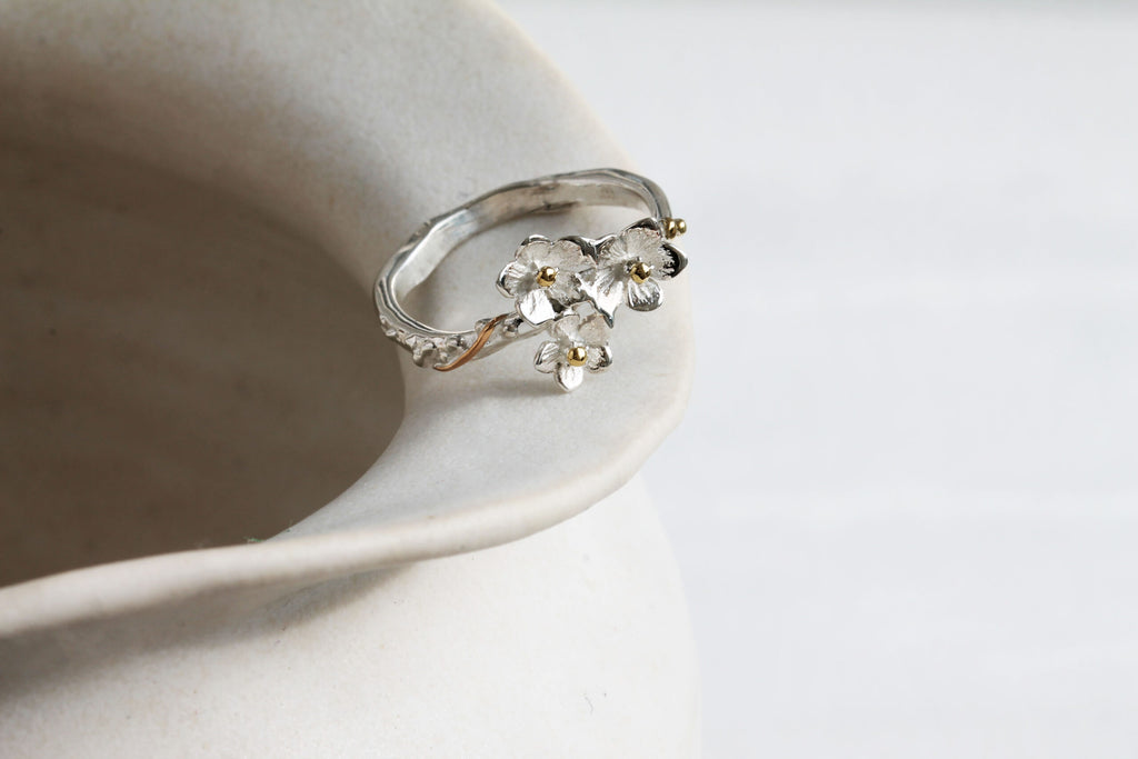 Ri0856 dainty floral silver, gold and brass ring